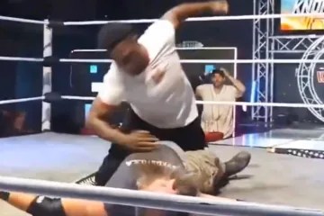 Raja Jackson assaults wrestler Syko Stu during a live streamed event.