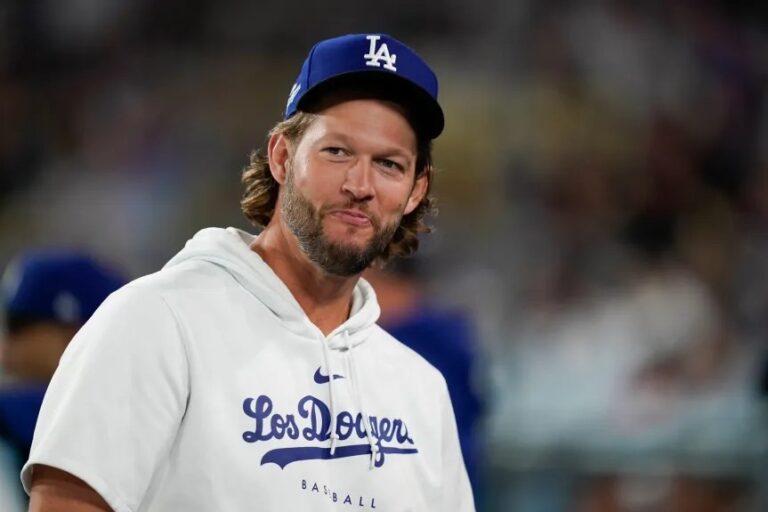 Dodgers pitcher Clayton Kershaw sits in the dugout during a game against the Detroit Tigers on Monday, Sept. 18, 2023, at Dodger Stadium. (AP Photo/Ryan Sun)