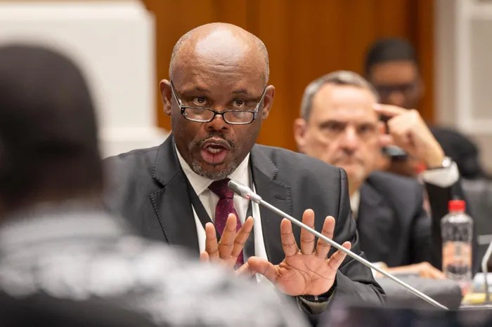 Suspended deputy national police commissioner Lt-Gen Shadrack Sibiya at the parliamentary ad hoc committee inquiry into alleged corruption and political interference in the criminal justice system in Cape Town on October 13 2025. (Gallo Images/Brenton Geach)