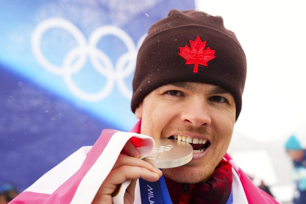 Mikael Kingsbury from Deux-Montagnes, Que., celebrates silver in the men’s moguls at the Milano Cortina 2026 Winter Olympic Games in Livigno, Italy on Thursday. | Sean Kilpatrick / The Canadian Press
