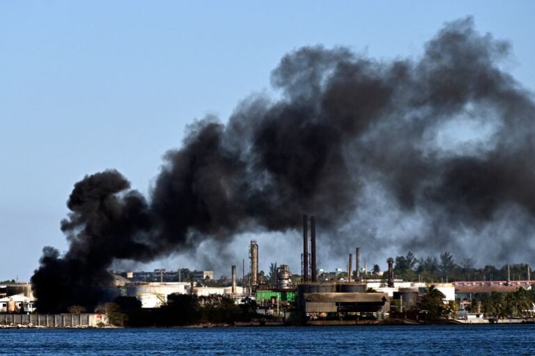 Black smoke billows from a fire at the Nico Lopez oil refinery in Havana, Cuba, on Friday | AFP