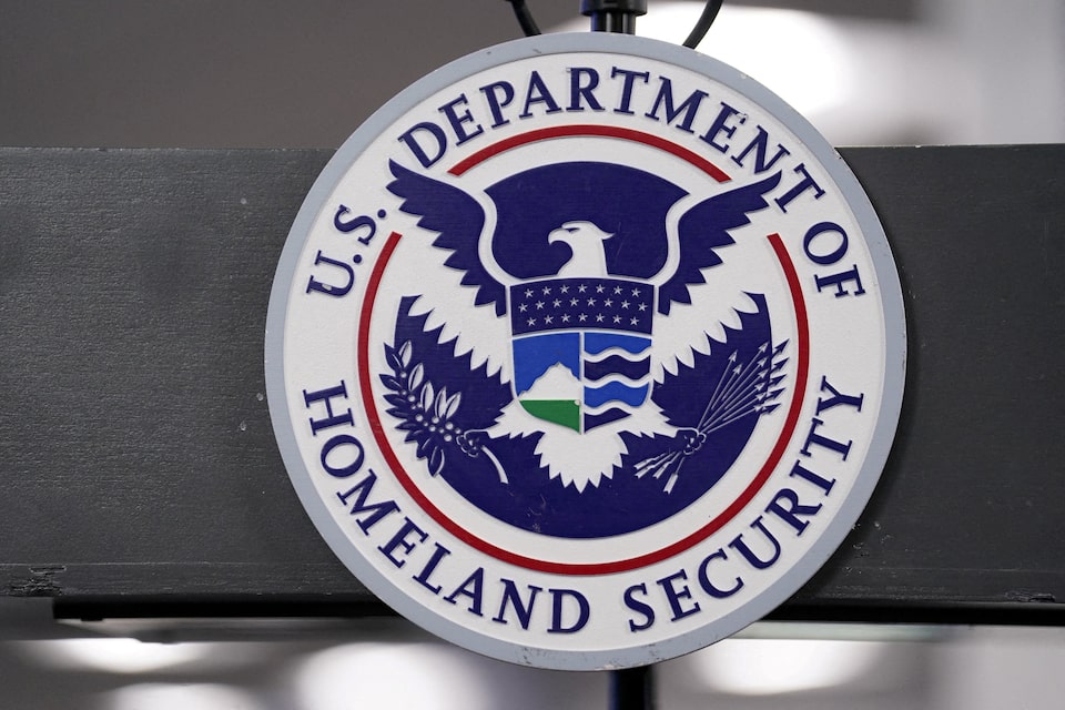 The U.S. Department of Homeland Security seal is displayed at the FEMA National Response Coordination Center in Washington, D.C., U.S., January 24, 2026. | REUTERS/Nathan Howard/File Photo