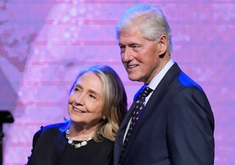 Former President Bill Clinton, left, and former Secretary of State Hillary Clinton listen as Vice President Kamala Harris delivers a eulogy for U.S. Rep. Sheila Jackson Lee, Aug. 1, 2024, in Houston. (AP Photo/LM Otero, File) | AP