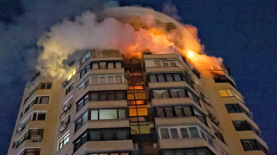 The upper floors of a multi-story building burn after debris from a Russian drone fell in Kyiv, Ukraine, Feb. 3, 2026. (Yan Dobronosov/Global Images Ukraine via Getty Images)