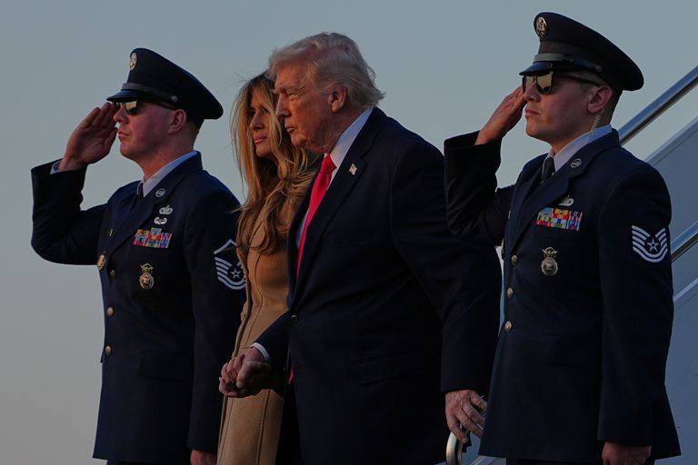 President Donald Trump and first lady Melania Trump arrive on Air Force One, at Palm Beach International Airport in West. | AP Photo/Matt Rourke