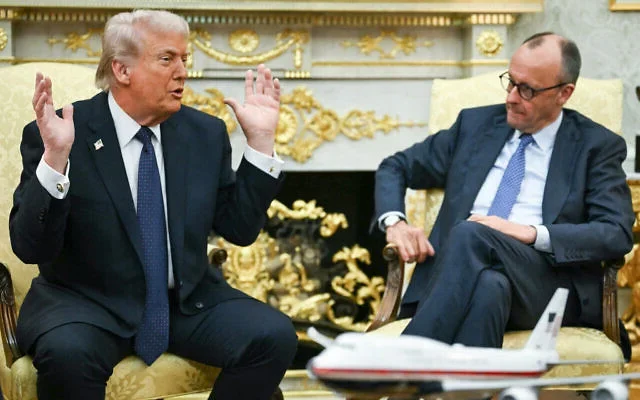 US President Donald Trump meets with German Chancellor Friedrich Merz in the Oval Office of the White House in Washington, DC on March 3, 2026. | ANDREW CABALLERO-REYNOLDS / AFP