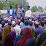 Babagana Zulum, the Borno state governor, speaks to people Friday in Pulka after they fled an attack by Islamic militants in Ngoshe. | Jossy Ola / Associated Press