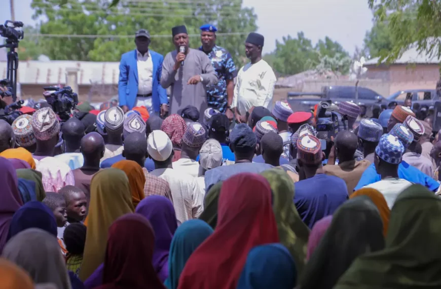 Babagana Zulum, the Borno state governor, speaks to people Friday in Pulka after they fled an attack by Islamic militants in Ngoshe. | Jossy Ola / Associated Press