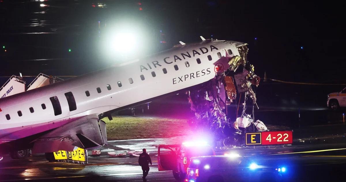 Air Canada jet collides with fire truck at LaGuardia, leaving two pilots dead Air Canada jet collides with fire truck at LaGuardia, leaving two pilots dead