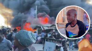 Rows of newly constructed stalls at Simu 2000 market in Ubungo, Dar es Salaam, with traders returning after a recent fire incident.