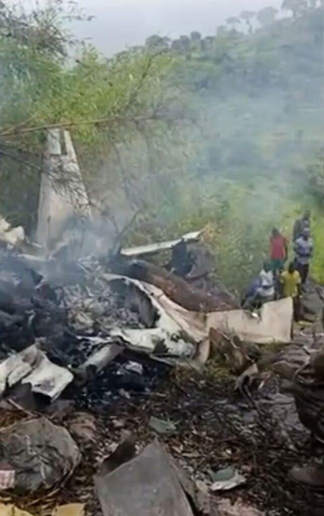 Crash site of a Cessna 208 Caravan aircraft near Juba, South Sudan, where rescue teams recover bodies after a fatal aviation accident.