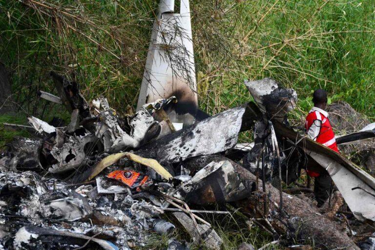 Crash site of a Cessna 208 Caravan aircraft near Juba, South Sudan, where rescue teams recover bodies after a fatal aviation accident.